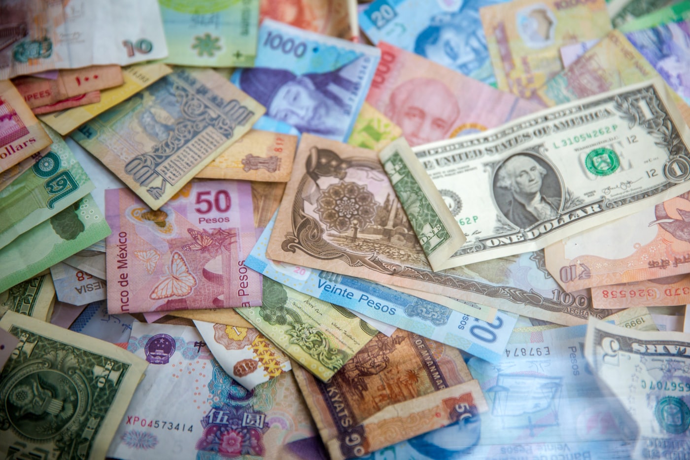 A spread of international banknotes