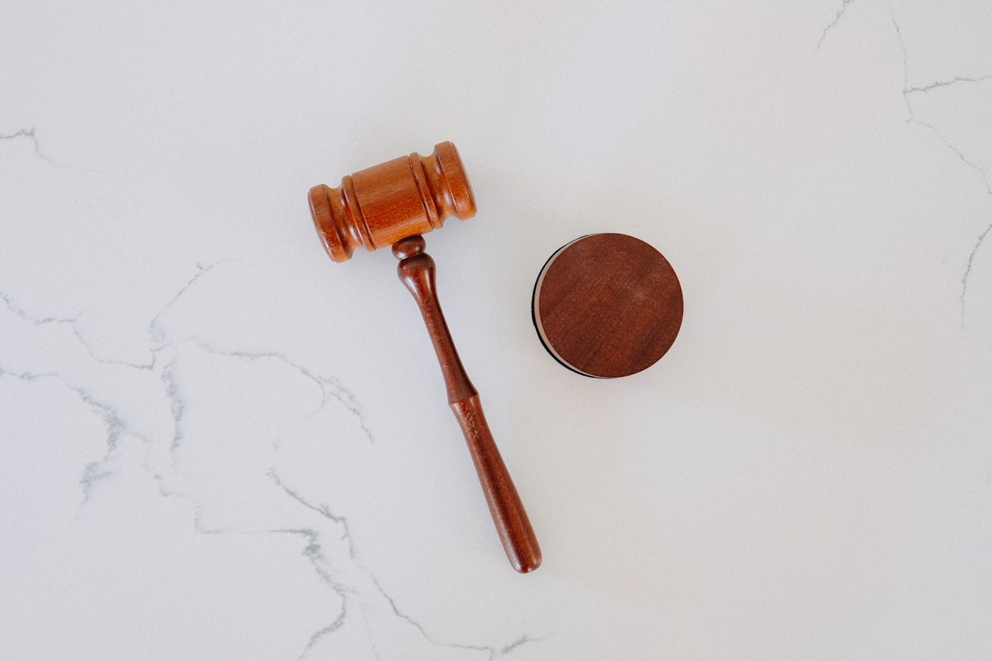 A judge’s gavel resting on a desk